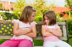 stock-photo-14274147-quarrel-offended-sisters