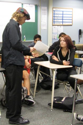 Senior PJ Gaughan discusses plans with fellow Human Rights students.