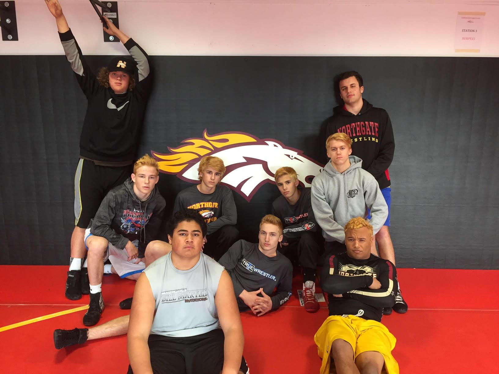 NCS participants Skylar Morford, Cormick Hamilton, David Ma'aki, Gage Mettler, Jaxon Pandelis, Cole Sanchez, Grant Chachere, Nathan Sutton, and Greg Ayala sport their bleached locks during practice.