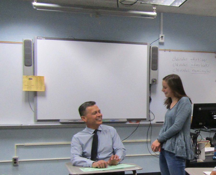Mr. Fajardo helps sophomore Olivia Wirig with her spanish work.