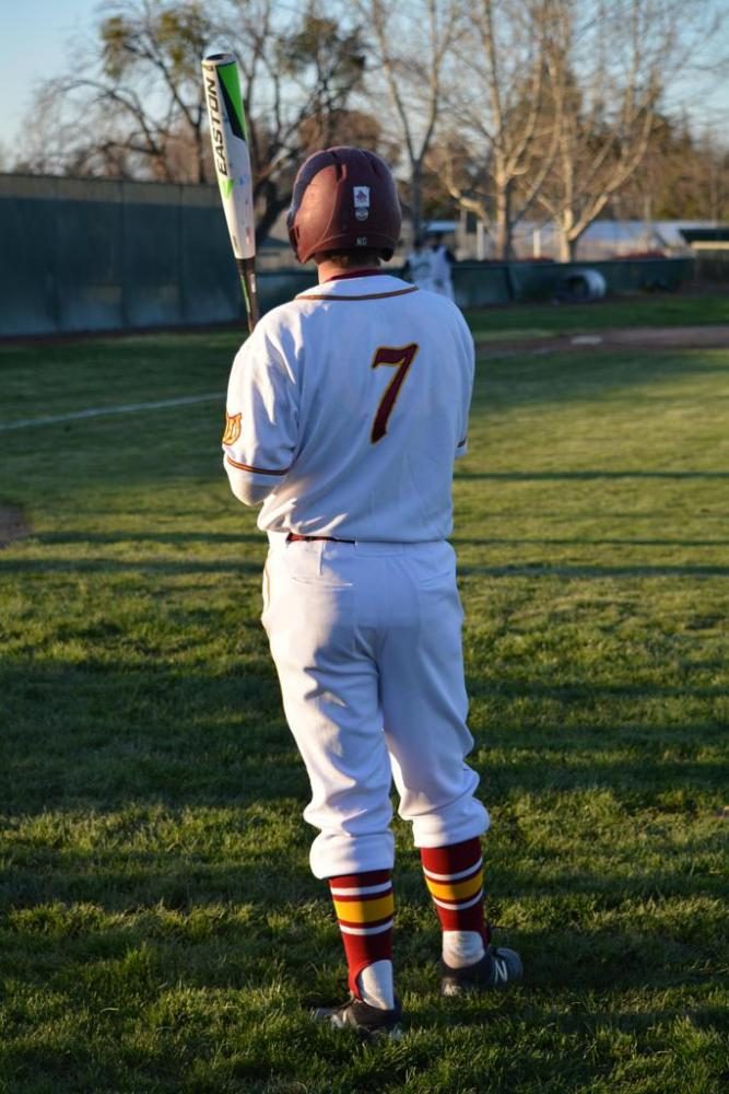 Junior Kevin Clancy gets in the zone before his at bat. 
