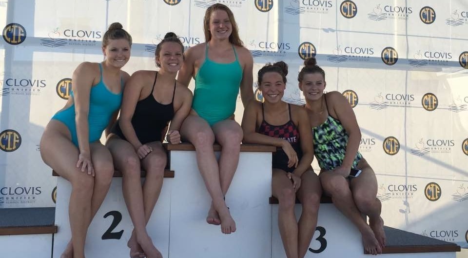 Seniors Carlie Polkinghorn, Rebecca Proctor, Bryn McGowan, junior Emma Smethurst, and senior Taylor Cossu, seen here before the start of the meet, competed May 19 and 20 in the CIF (California Interscholastic Federation) swim meet.