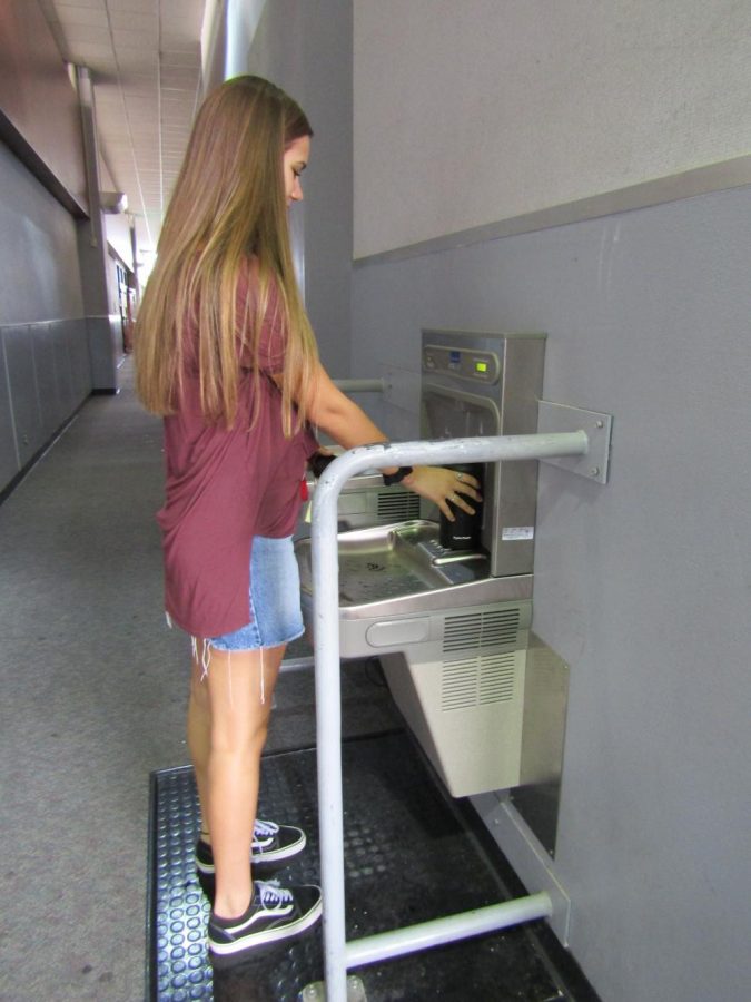 Junior Emma Meril tests out the new hydration stations.