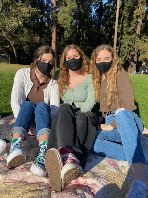 Senior Margot Smethurst, far right, set a 2020 goal to read more and completed 35 books. This year Smethurst, with Northgate friends Emily Titterton, left, and Sarah Bonano, at a park in Berkeley recently, has added fitness goals. 