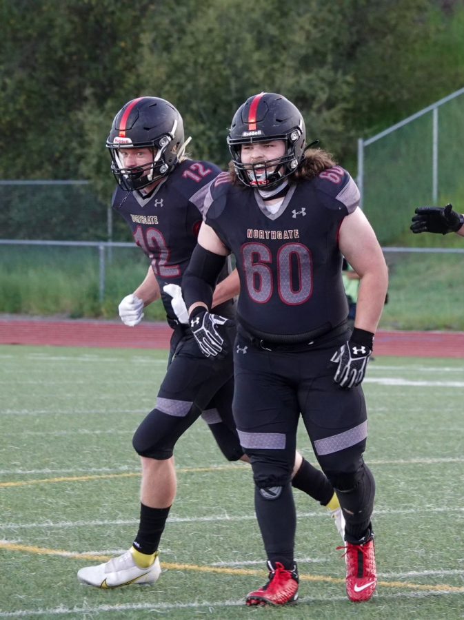 Seniors Andrew Daigle, left, and Cooper Champion are two of the varsity Broncos who will be on the field April 2 for the first home football game. Junior varsity plays at 4:40 p.m. and varsity kicks off at 7 p.m.