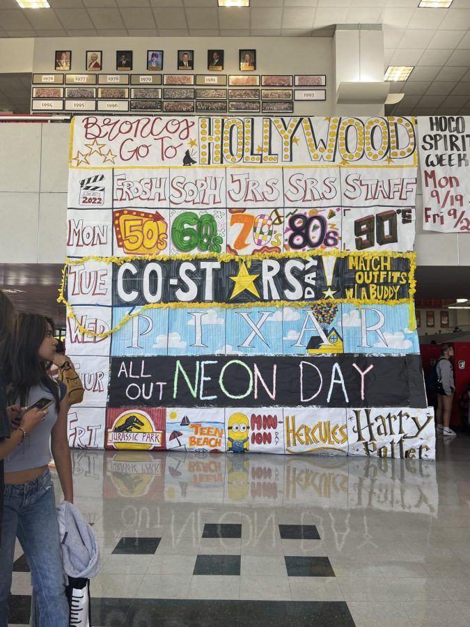 Themed dress-up days are a longtime tradiiton for students and staff, as is the 20-foot tall poster in the forum advertising the themes for different grades of students and staff on days.