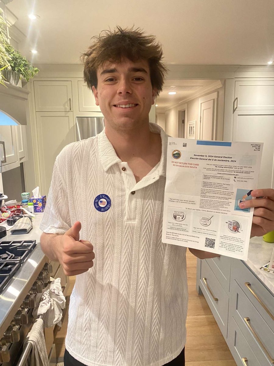 Senior Grayson Boustead, one of many 18-year-old seniors preparing to vote, is casting his ballot by mail.